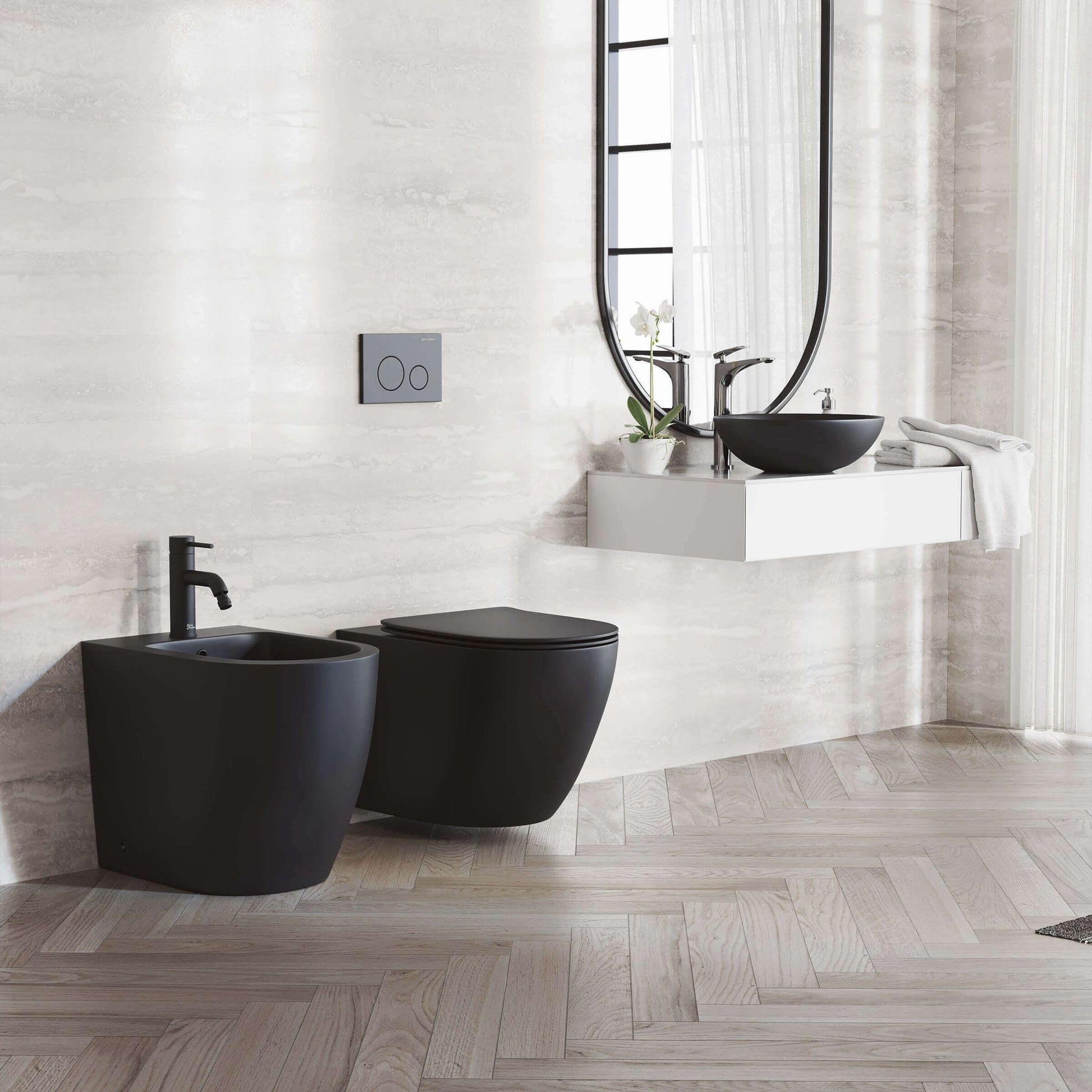 St. Tropez Bidet - side angled view in a bathroom in color black