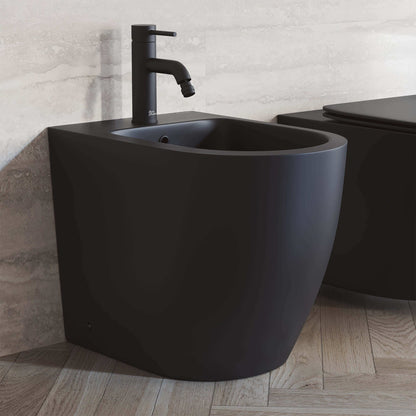 St. Tropez Bidet - side angled view in a bathroom in color black