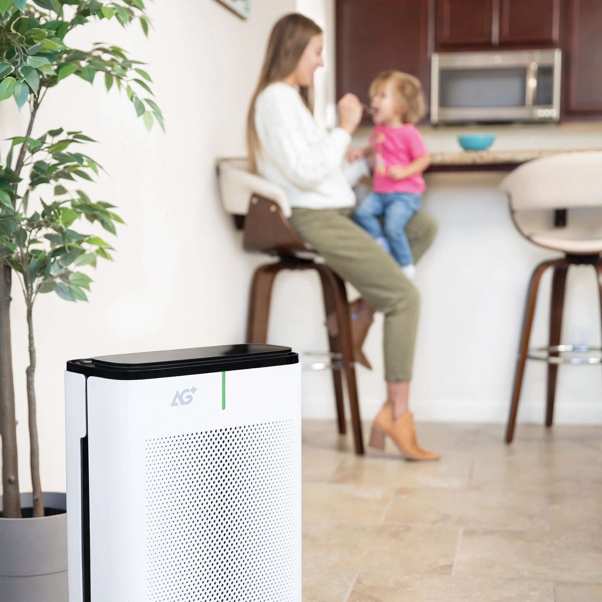 Brondell Pro Sanitizing Air Purifier with AG+ Technology for Purification of SARS-CoV-2, Virus, Bacteria and Allergens - front view in a kitchen