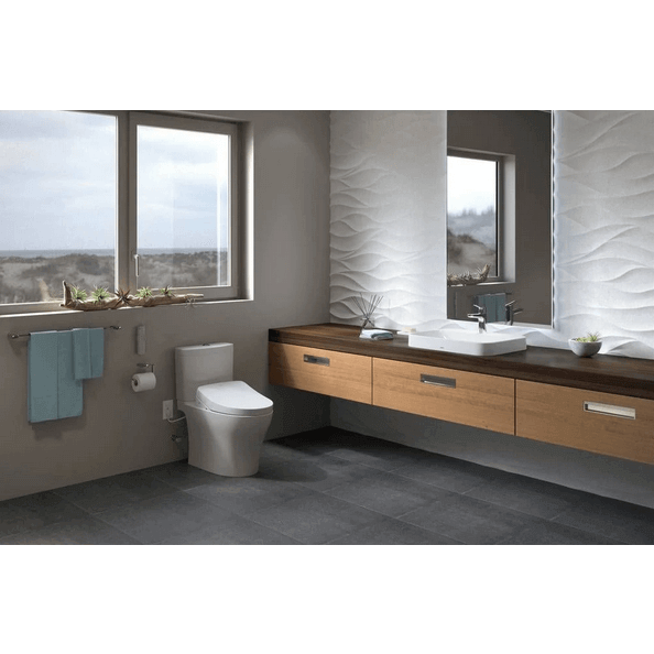 S550e Washlet Auto Classic Lid Bidet Seat - side angled view attached to a toilet in a bathroom