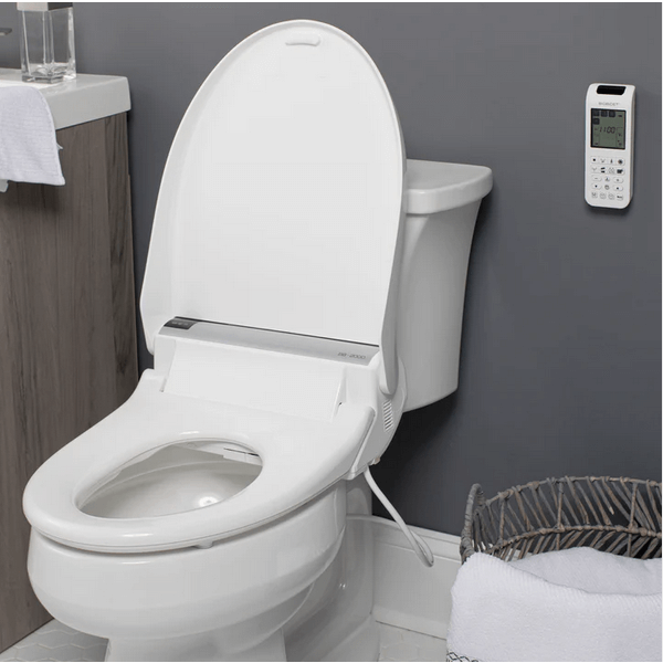 Bliss BB-2000 Bidet Seat - side angled view attached to a toilet in a bathroom with lid open