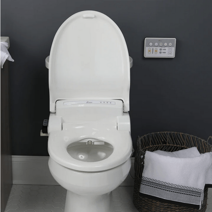 BB-1000 Supreme Bidet Seat - front view attached to a toilet in a bathroom with lid open