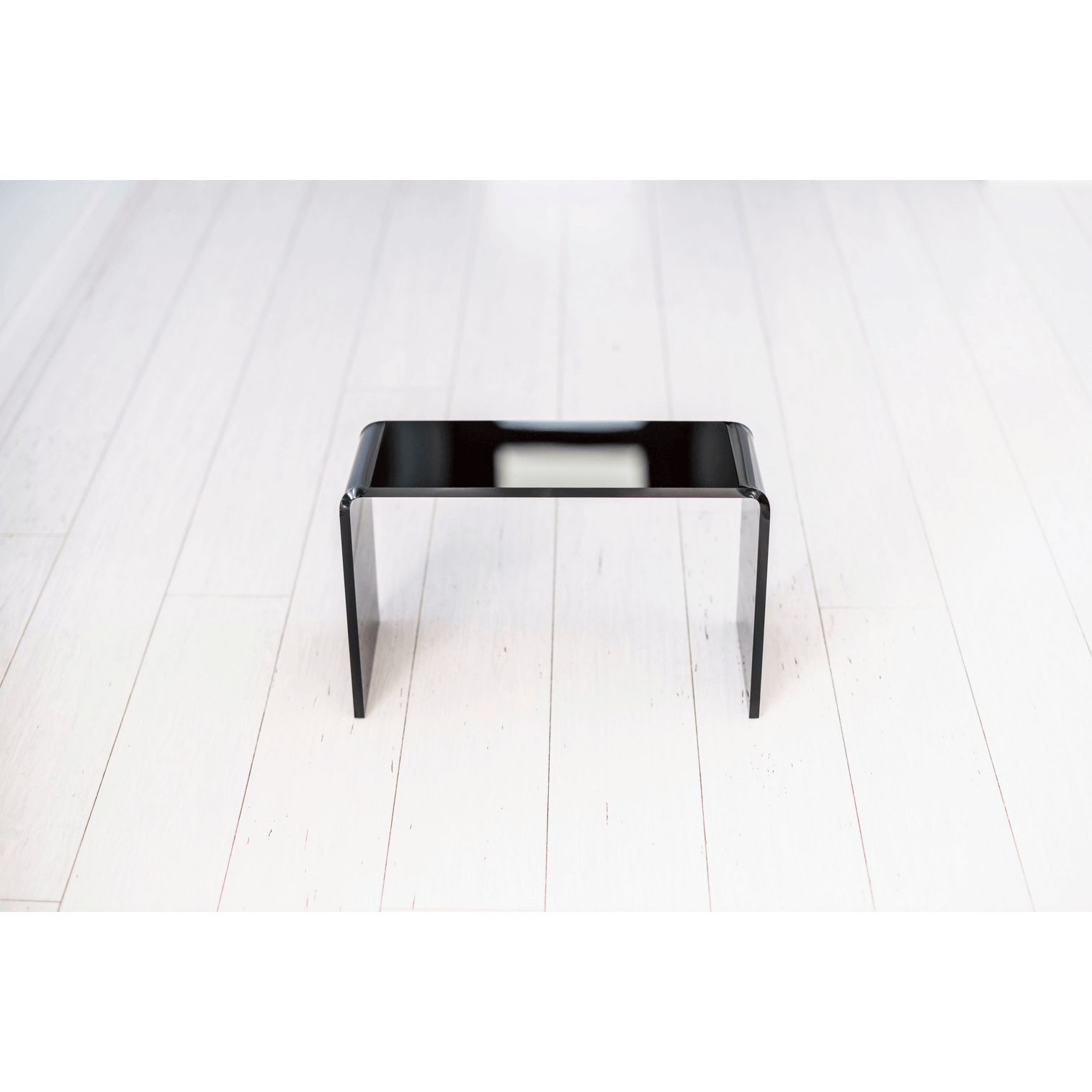 The PROPPR Acer - Black Toilet Foot Stool - front angled view in a bathroom