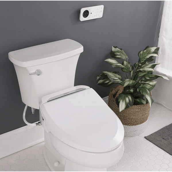 USPA Pro Bidet Seat - side angled view attached to a toilet in a bathroom