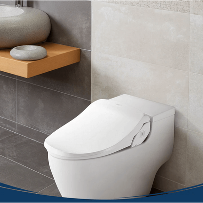 Slim Two Bidet Seat - side angled view attached to a toilet in a bathroom