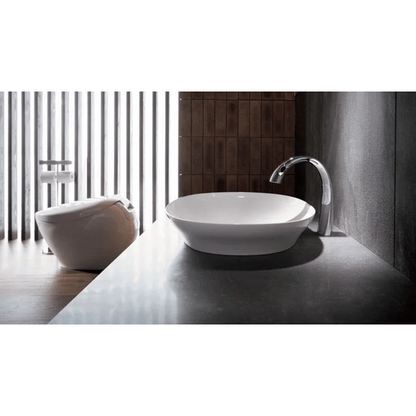 Neorest NX1 Dual Flush Bidet Toilet - side view in a bathroom